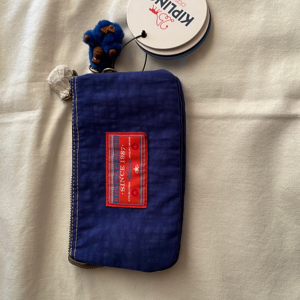 NWT Kipling limited edition sporty blue pouch